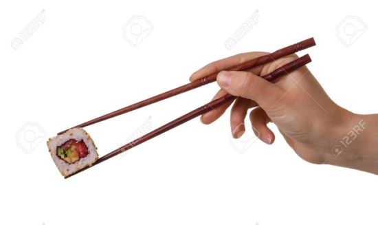 Рука с палочками для суши