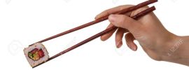 Рука с палочками для суши