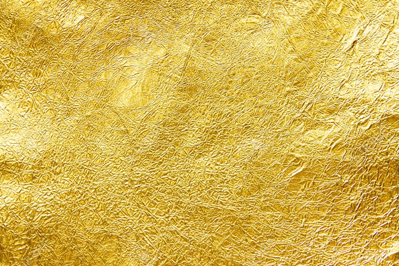 Желтая фольгированная бумага текстура