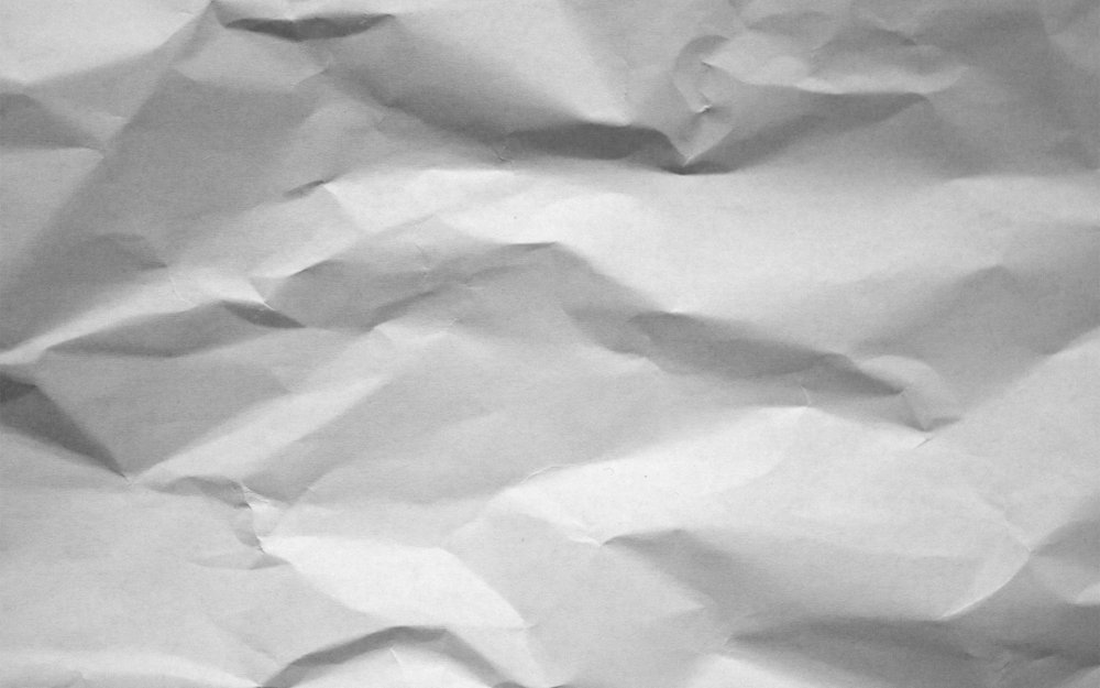 Белая бумага сложенная