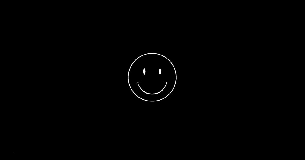 Улыбающийся Смайл на черном фоне