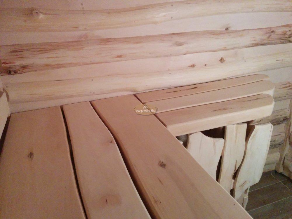 Отделка фасада необрезной доской