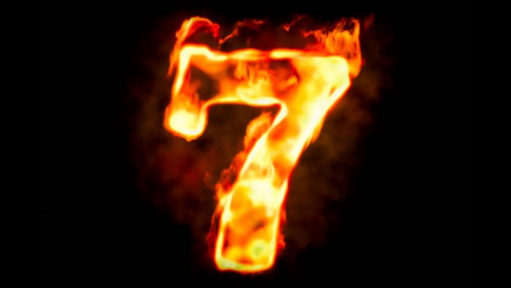 Огненные буквы на черном фоне