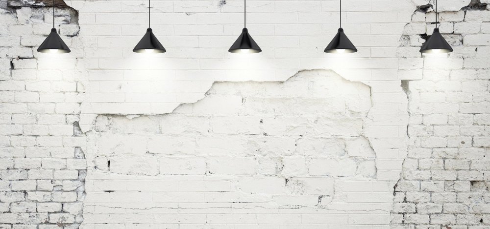 Белая кирпичная стена ъ