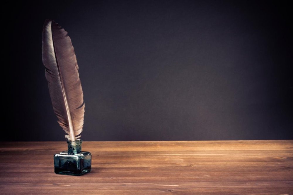 Перо и чернильница