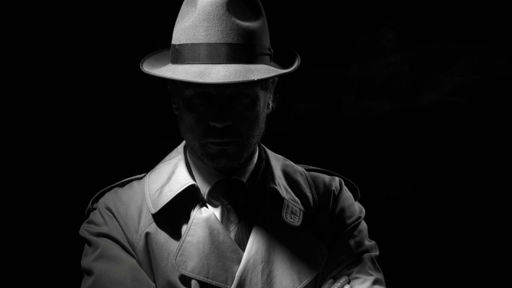 Человек в шляпе Нуар