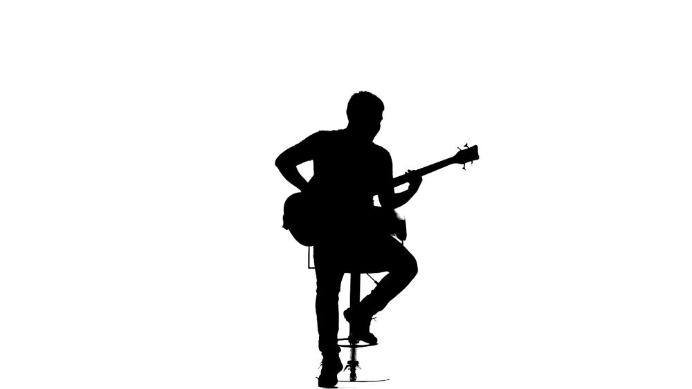 Силуэт человека с гитарой