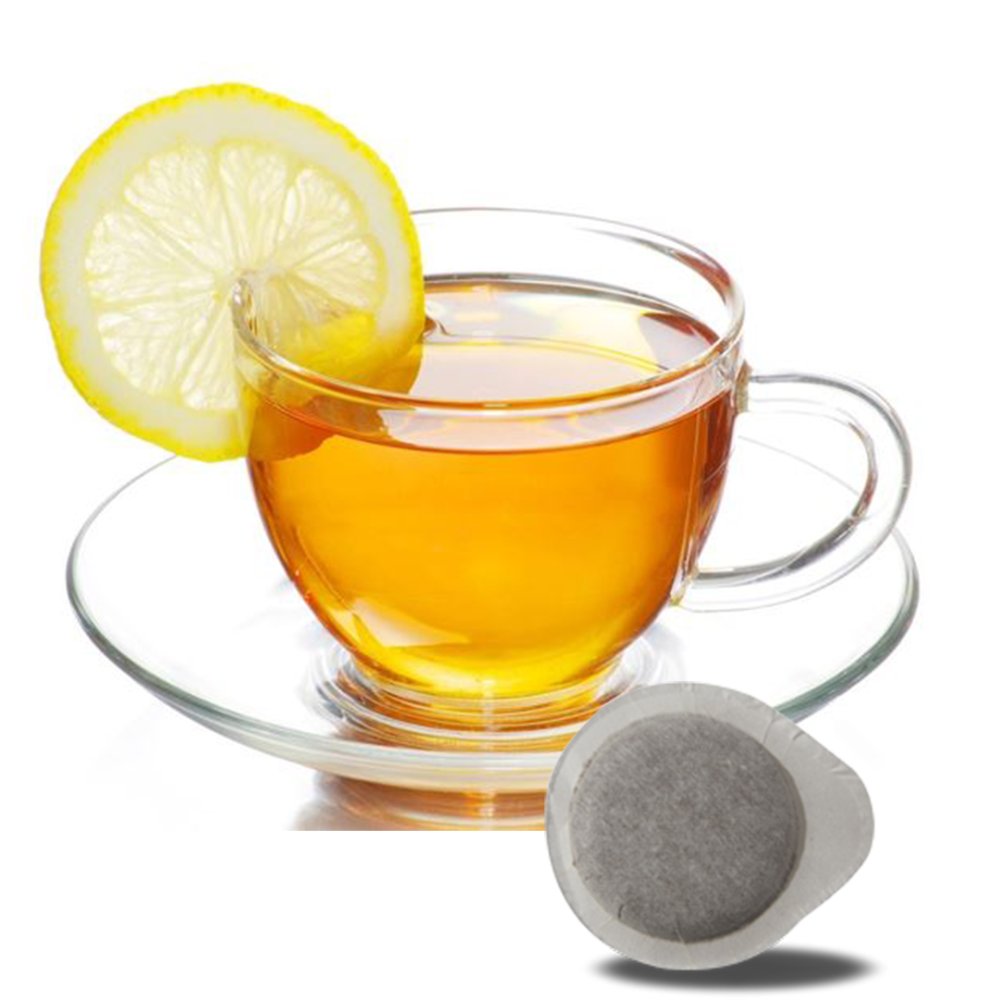 Чай с лимоном на белом фоне