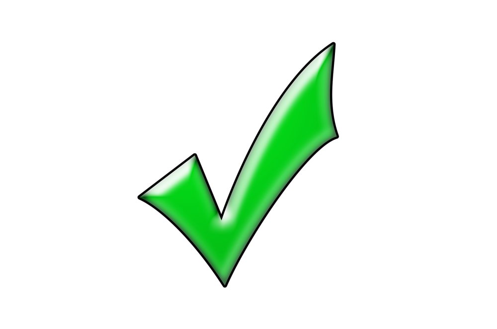 Зеленая галочка на белом фоне