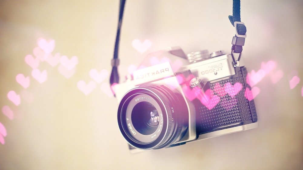 Фотоаппарат на красивом фоне