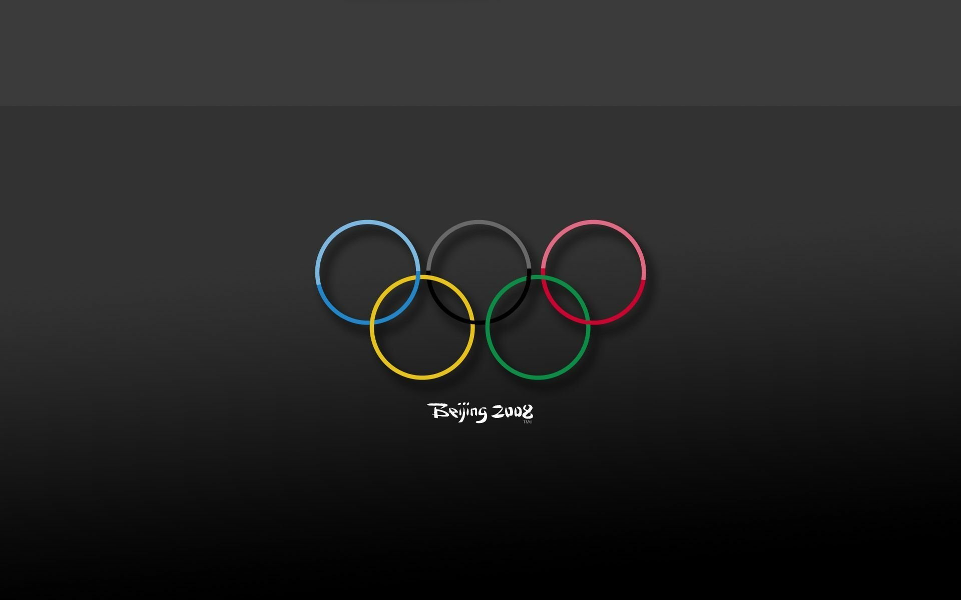 Олимпийские кольца на темном фоне