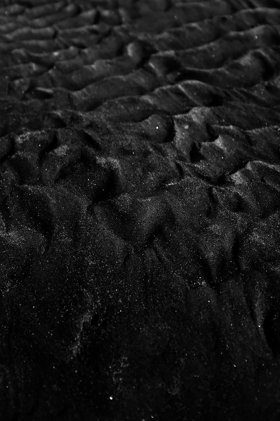 Песок на черном фоне