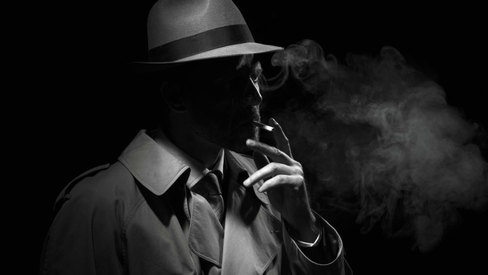Нуар мужчина в шляпе