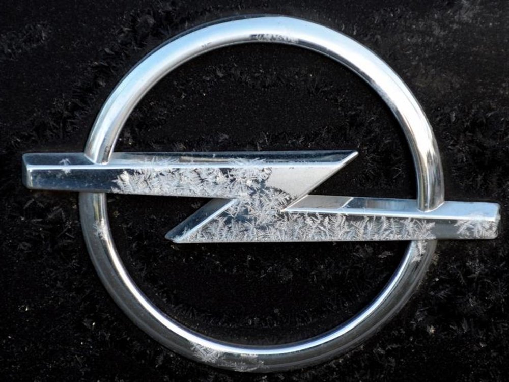 Эмблема Опель