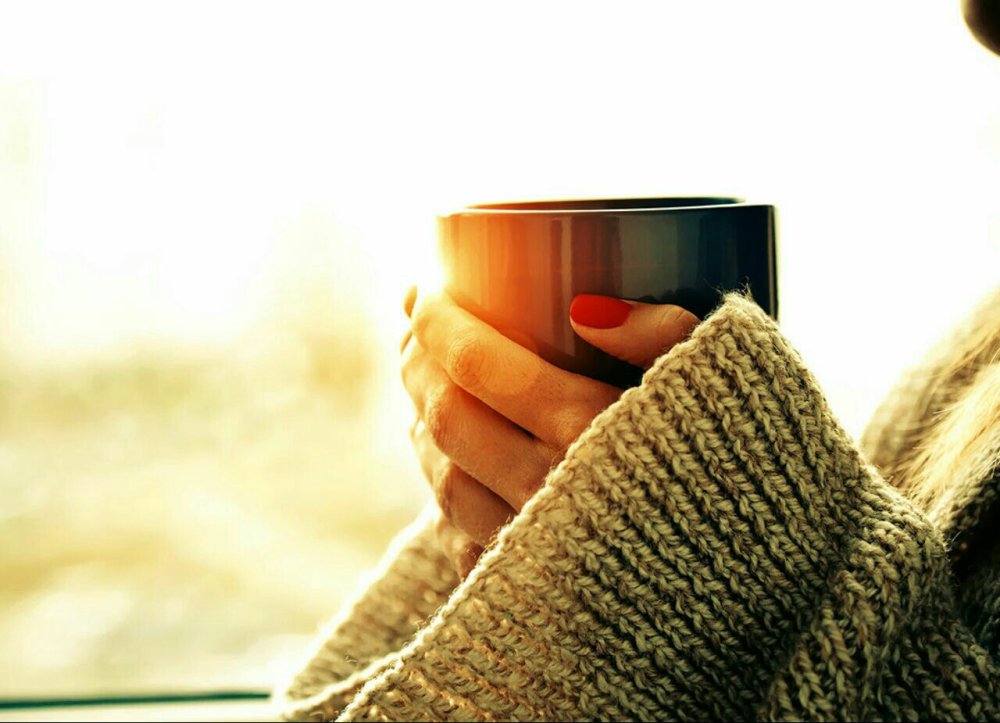 Чашка кофе в руках