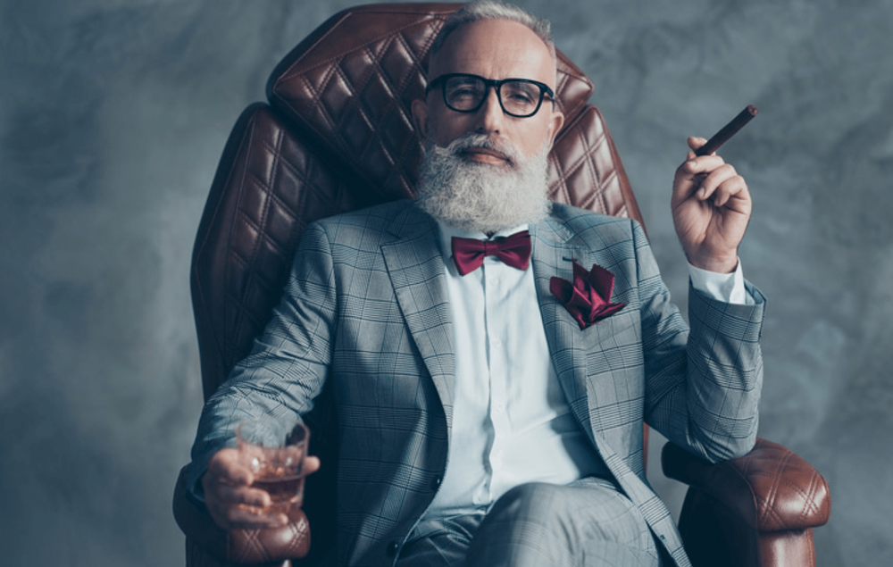 Успешный мужчина с сигарой