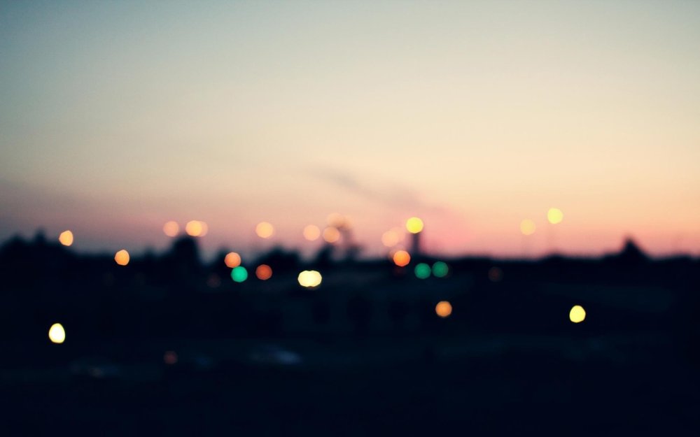 Размытый город закат