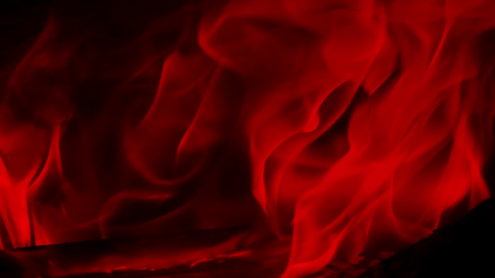 Красный дым на черном фоне