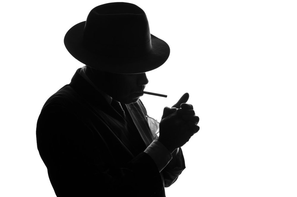 Силуэт мужчины с сигарой