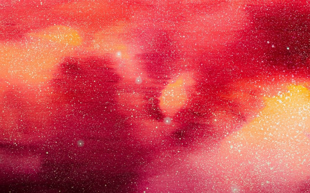 Красный фон с блестками и бликами