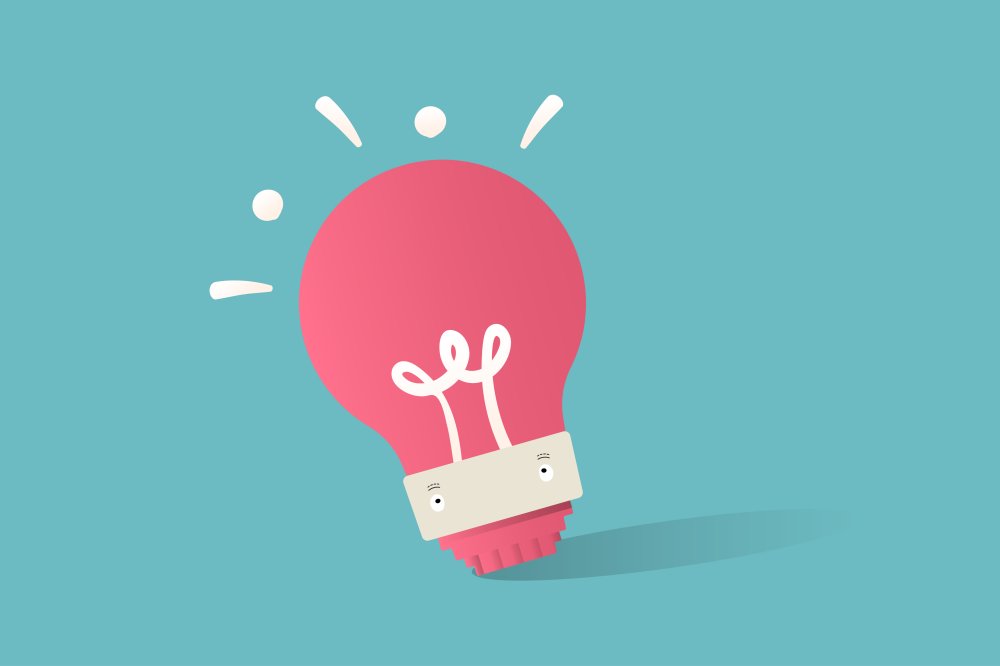 Лампочка на розовом фоне