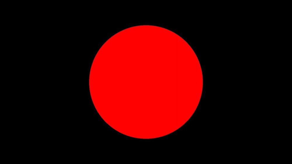 Красная точка на черном фоне