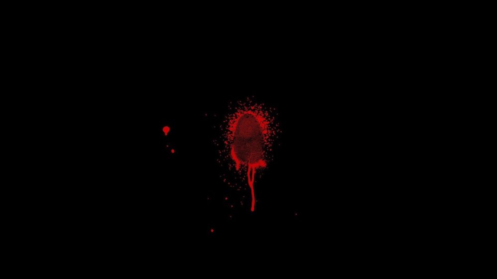 Капля крови на черном фоне