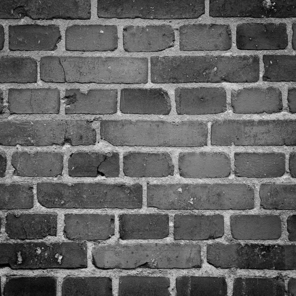 Серая кирпичная стена