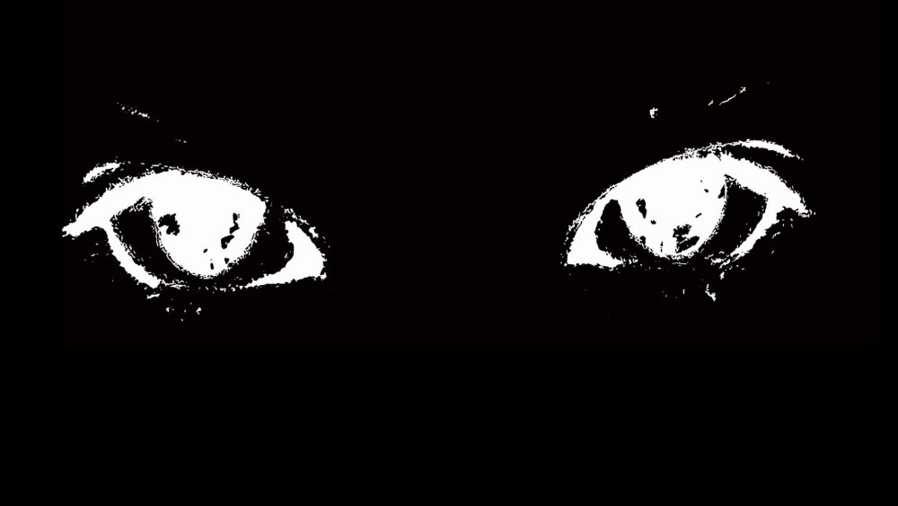 Белые глаза на черном фоне