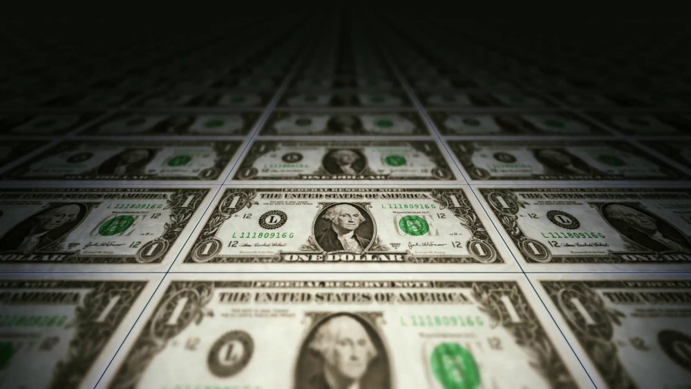 Доллары на темном фоне