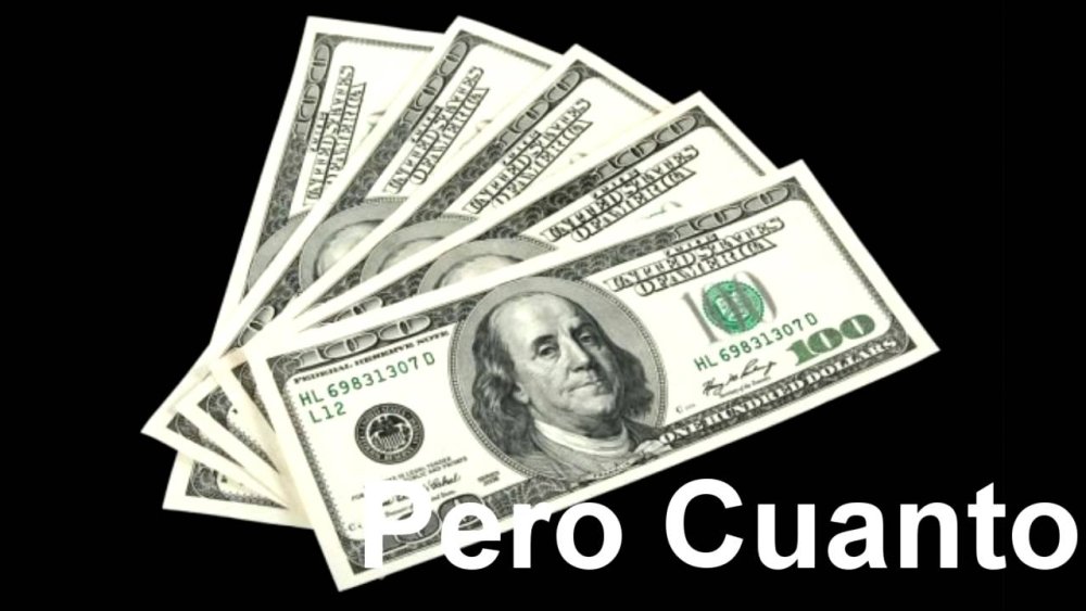 Пачка долларов на черном фоне