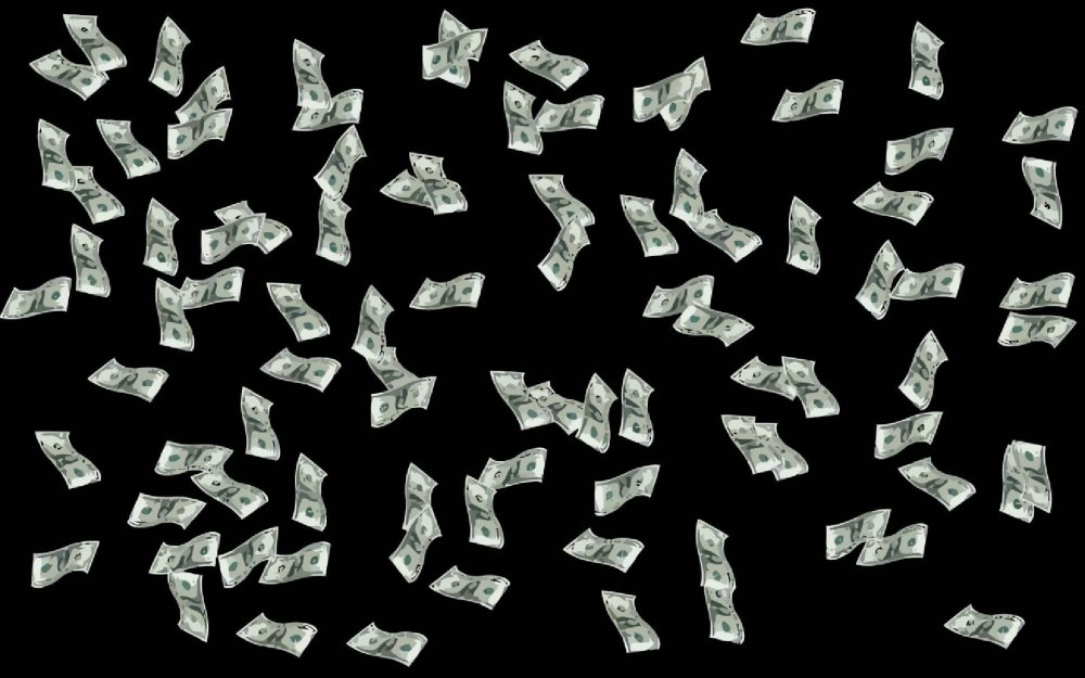 Купюры на черном фоне