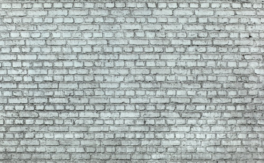 Белая кирпичная стена