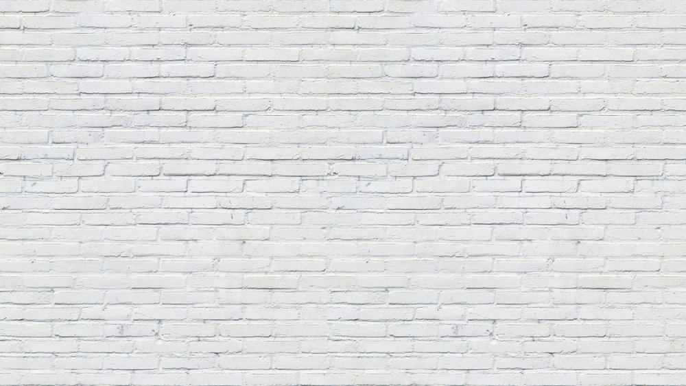 Белая кирпичная стена