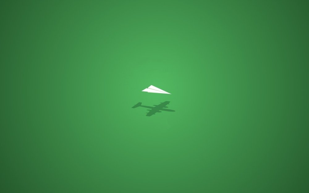 Зеленые листья на белом фоне