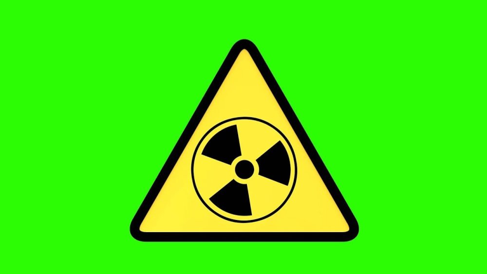Знак радиации зеленый
