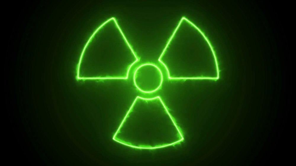 Знак радиации зеленый