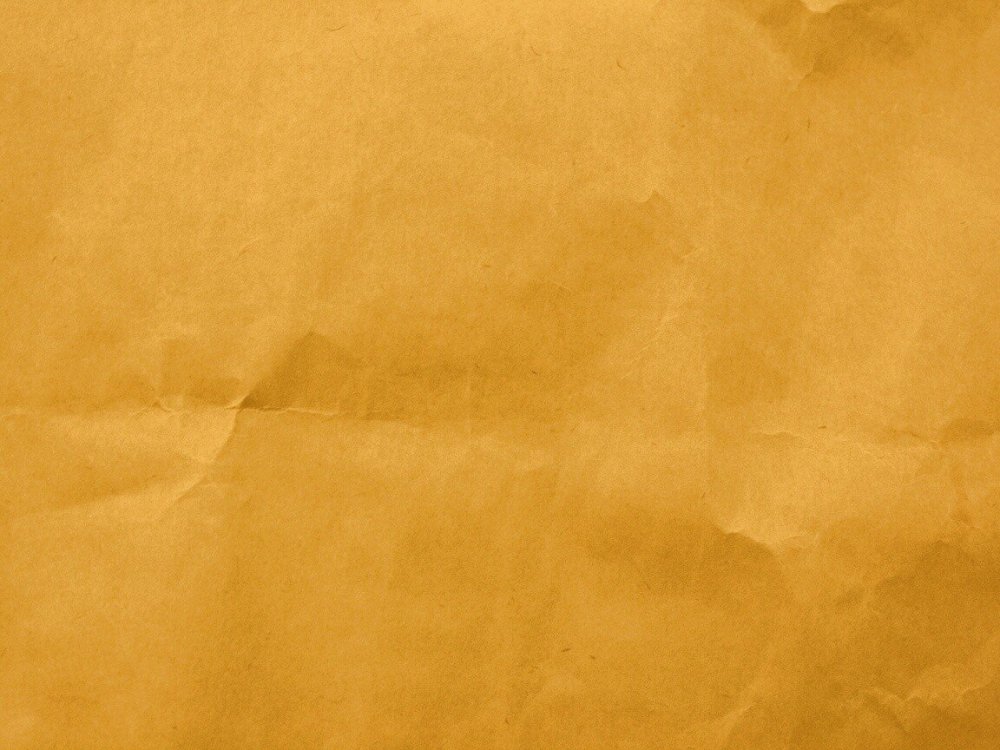 Желтая мятая бумага