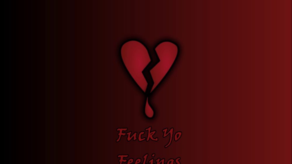 Разбитое сердческо на чёрном фоне