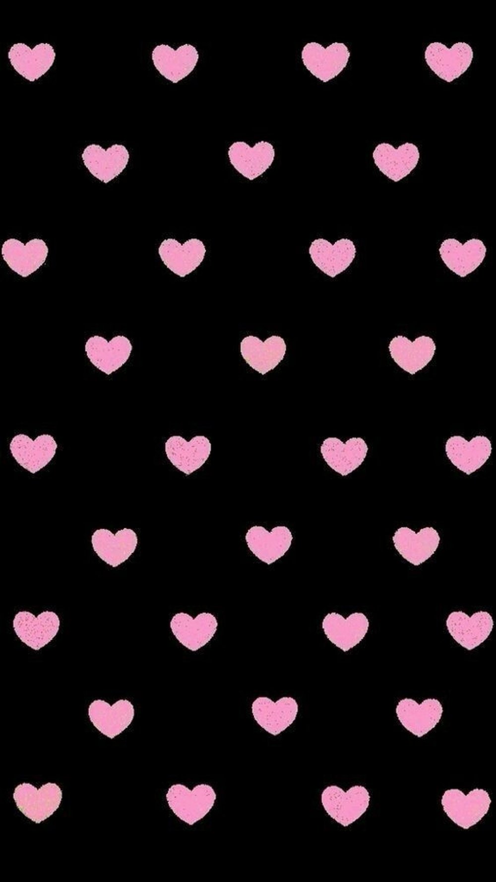 Розовое сердечко на черном фоне