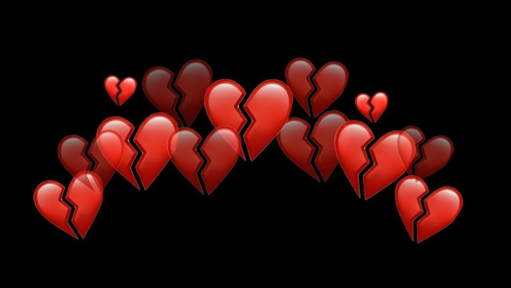 Разбитые сердца на черном фоне