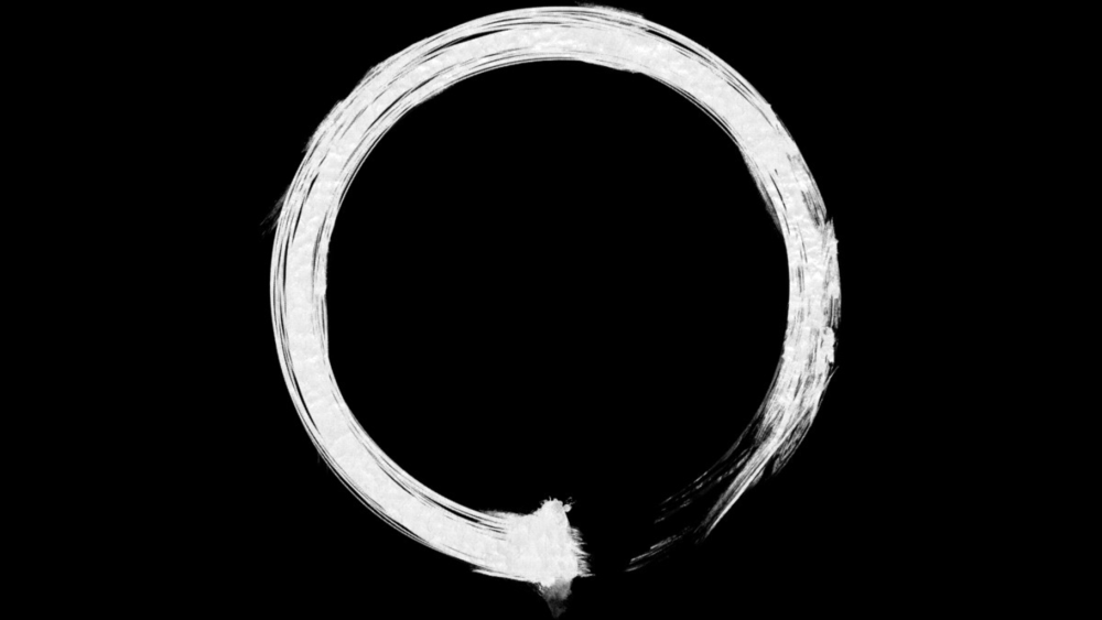 Белый круг на черном фоне