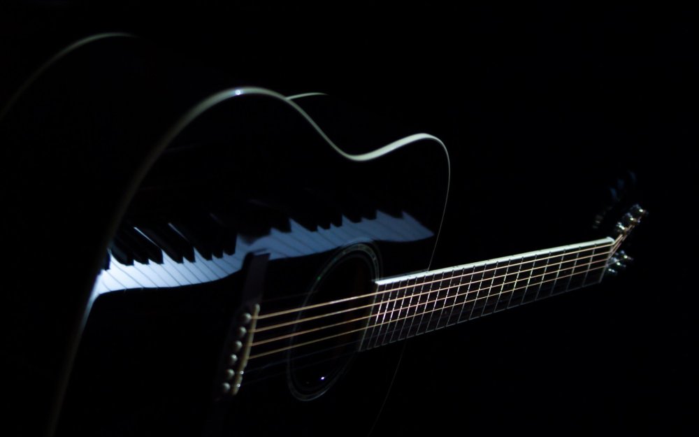 Электрогитара на черном фоне