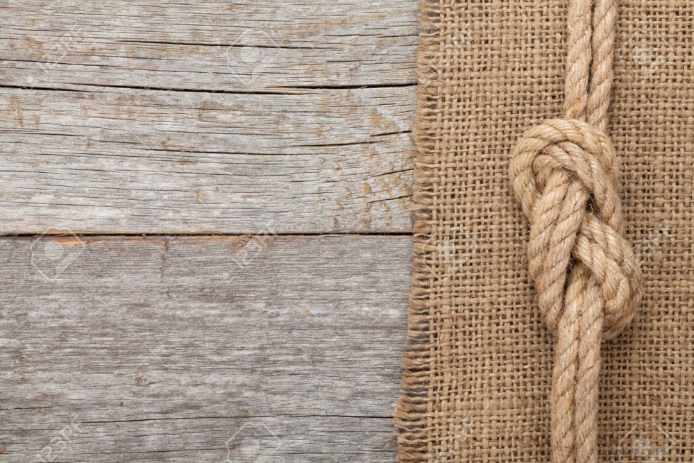 Деревянный фон с мешковиной