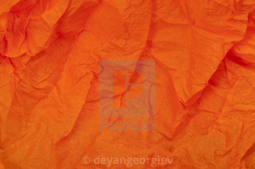 Оранжевый мятый лист