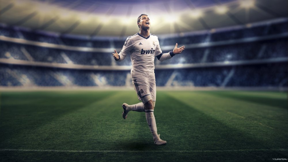 Футболист с мячом