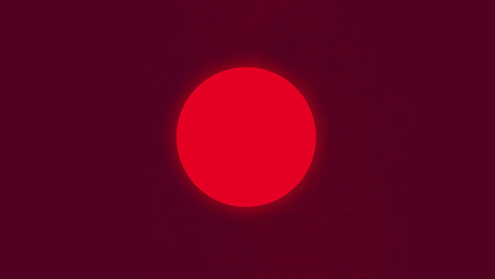 Красный круг на черном фоне