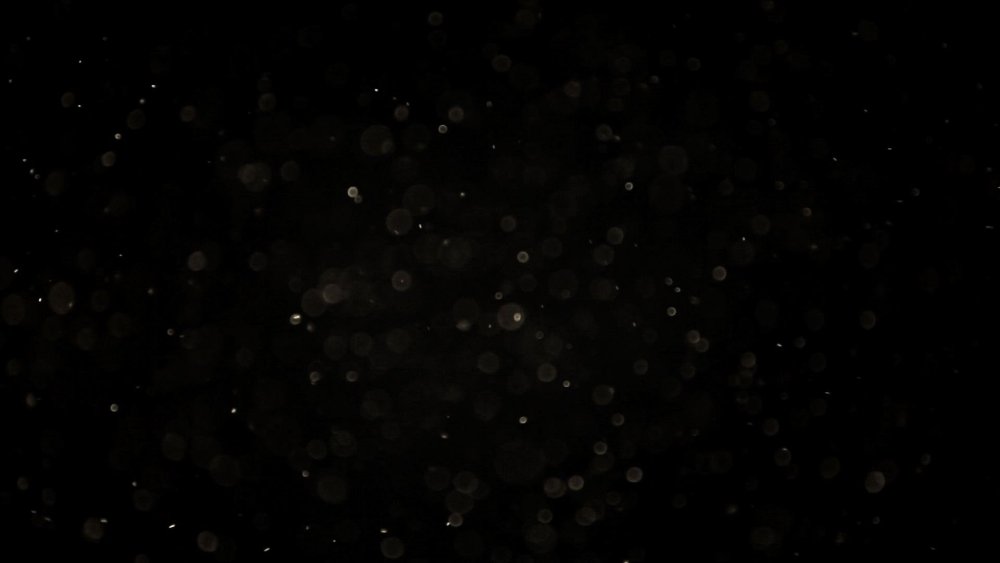 Частицы на черном фоне