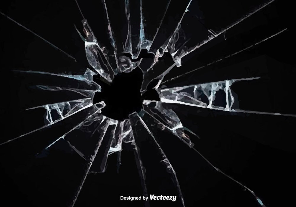 Трещины на стекле на черном фоне