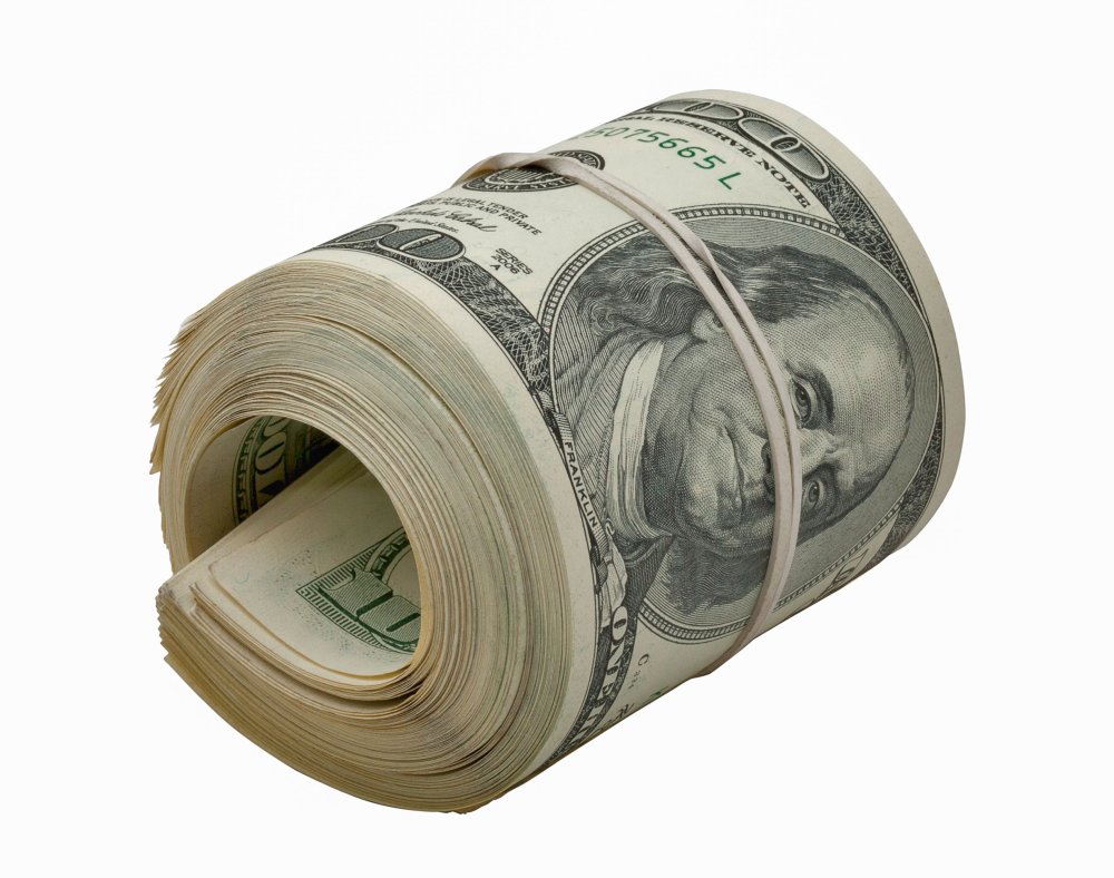 Доллары свернутые в трубочку